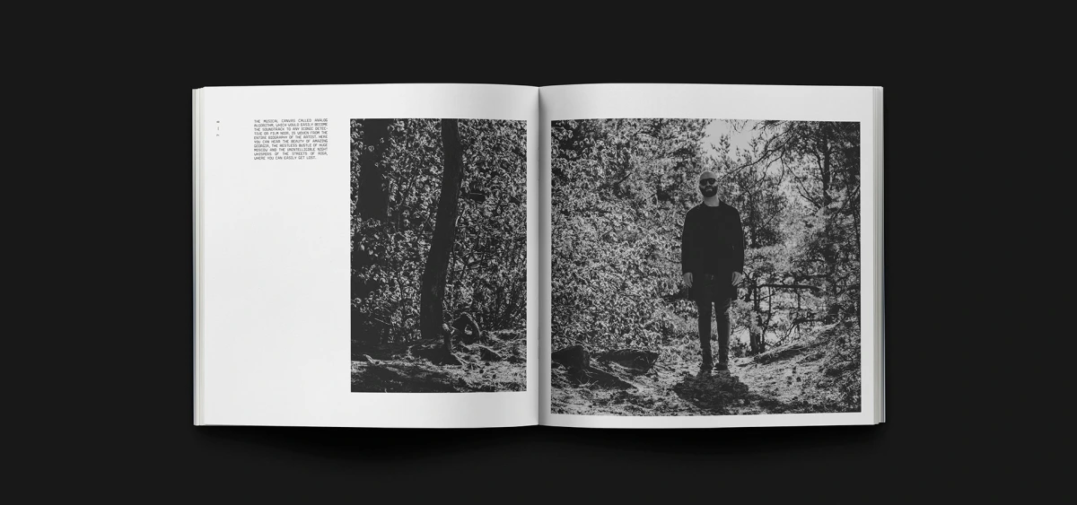Open spread with text column and full-page photo of man in forest