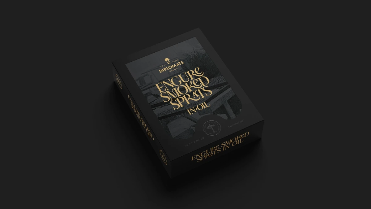 Black Diplomats Engure Smoked Sprats box with gold foil lettering on dark background
