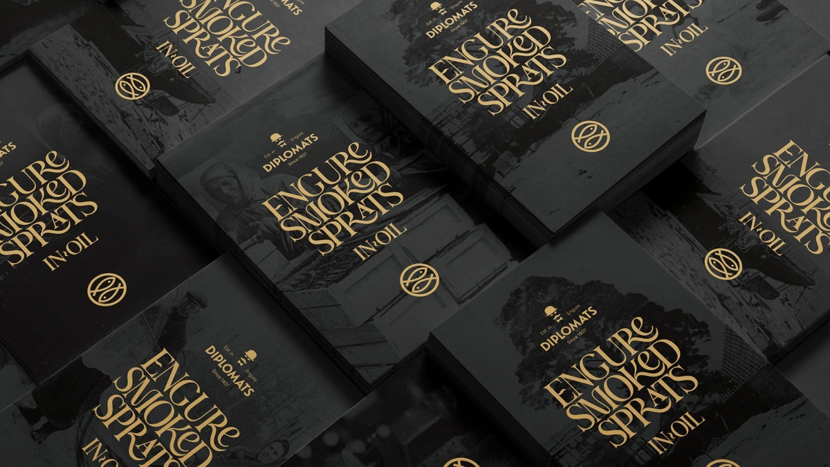 Several black Diplomats Engure Smoked Sprats boxes arranged in a diagonal pattern
