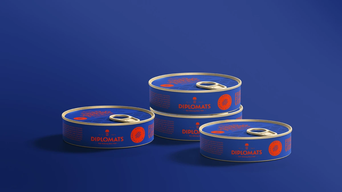 Four stacked Diplomats Fried Herring Fillets tins in blue packaging