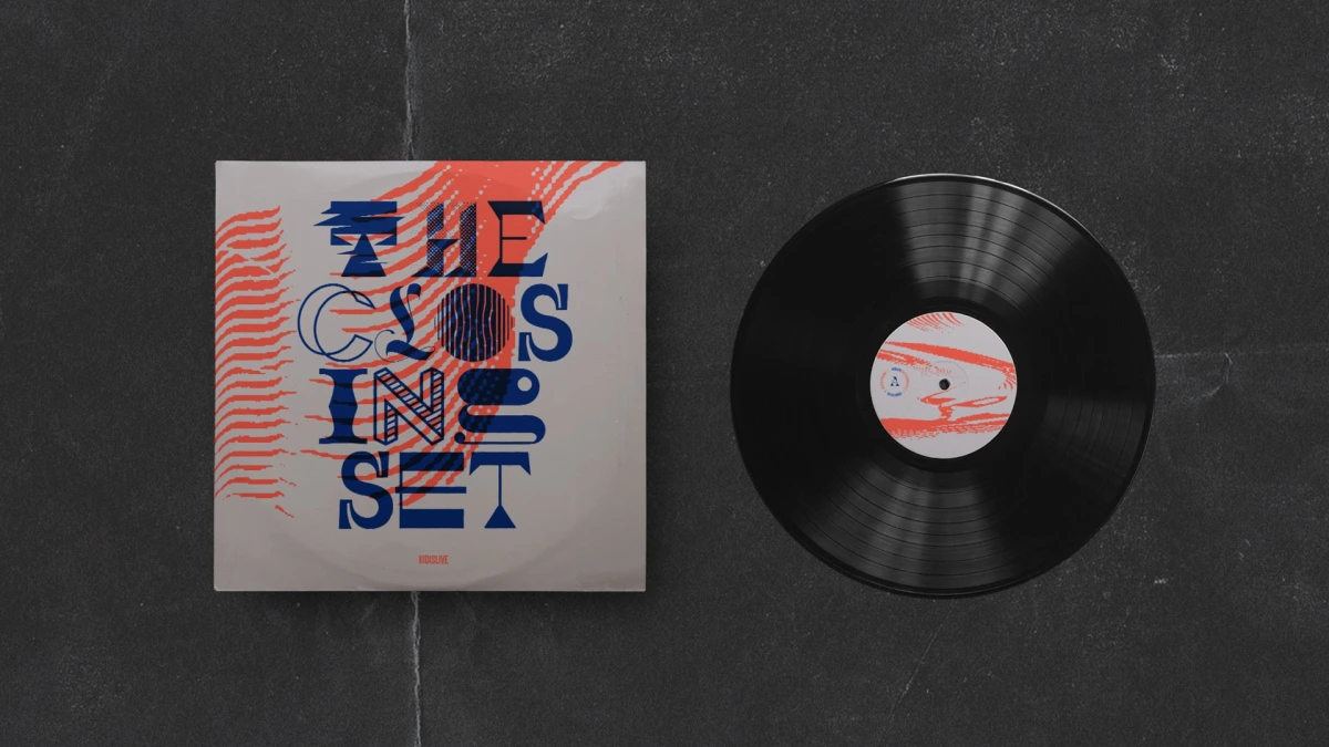 The Closing Set EP sleeve beside its black vinyl record on dark concrete