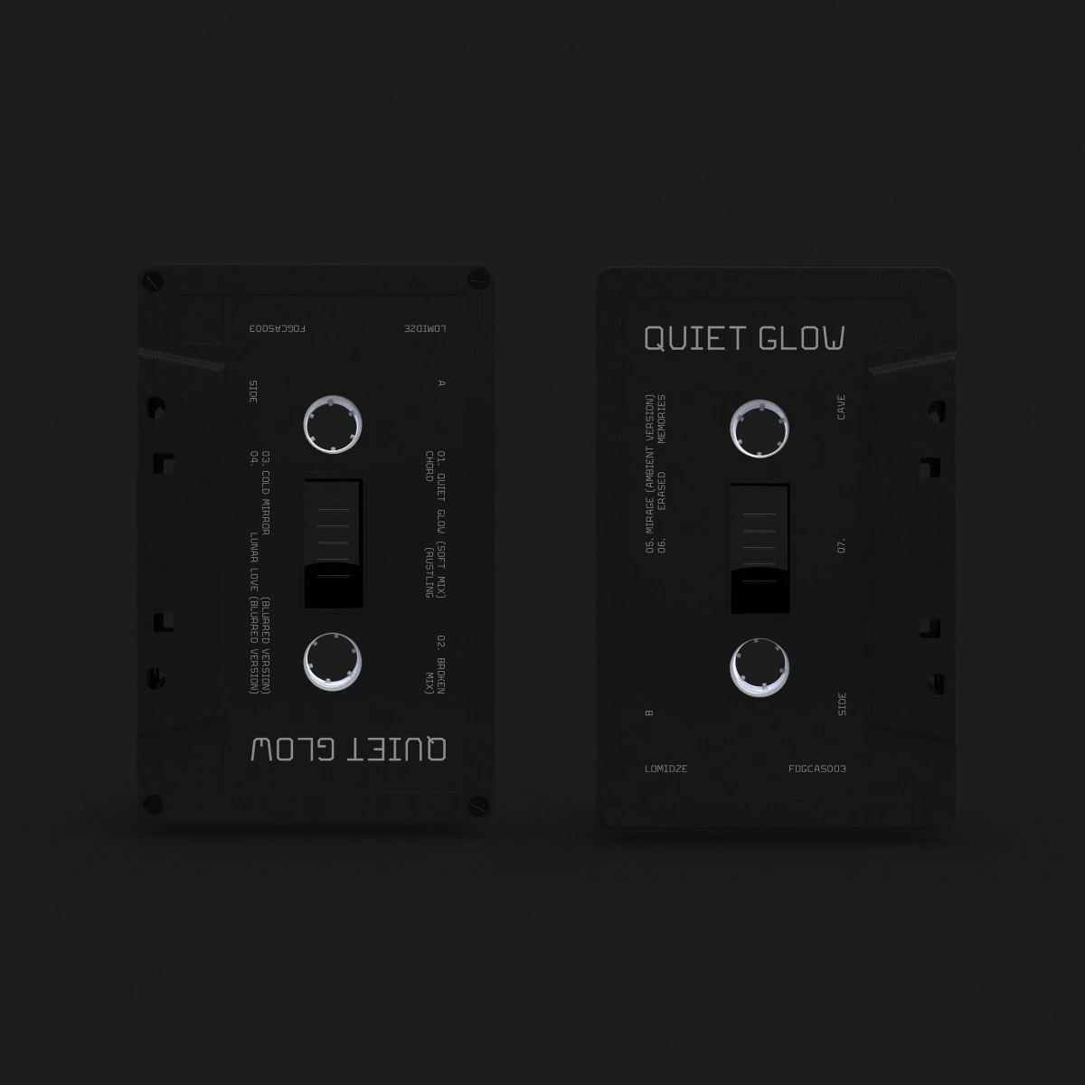 Two black Quiet Glow cassette tapes by Lomidze shown front and back