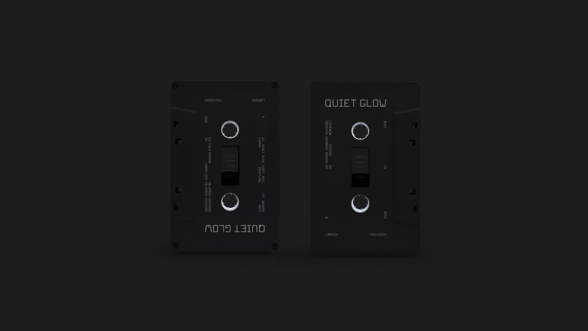 Two black Quiet Glow cassette shells shown front and mirrored back view