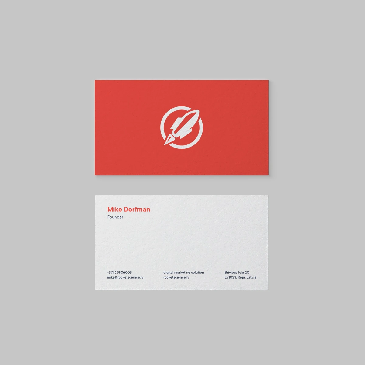Rocket Science business card, red front and white back