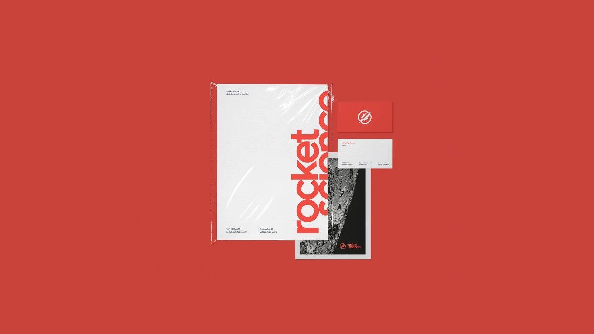 Rocket Science letterhead, business cards and poster mockup on red background