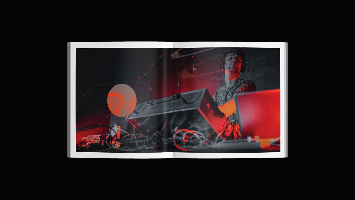The Gimp book spread, musician at red-lit studio gear