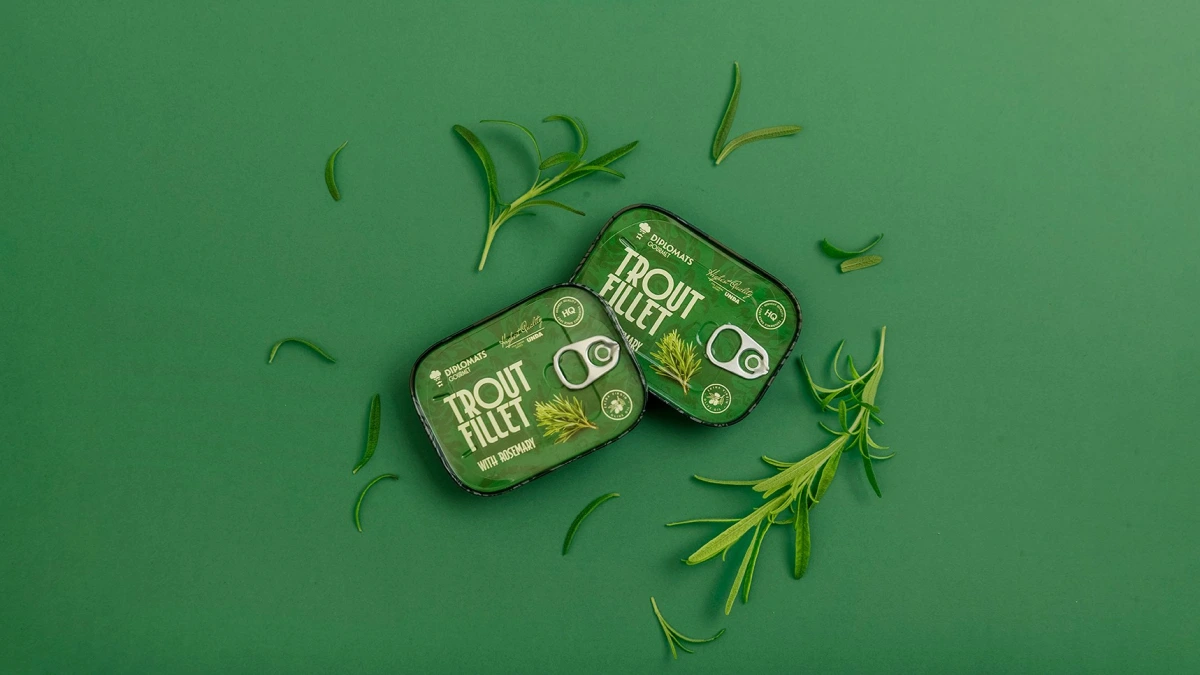 Trout Fillet rosemary tins from above, large sprig and loose needles scattered