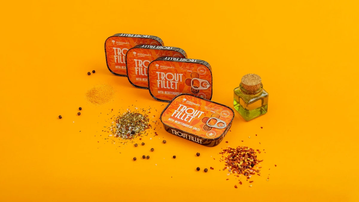 Trout Fillet Mediterranean spice tins stacked with spice mix and oil bottle